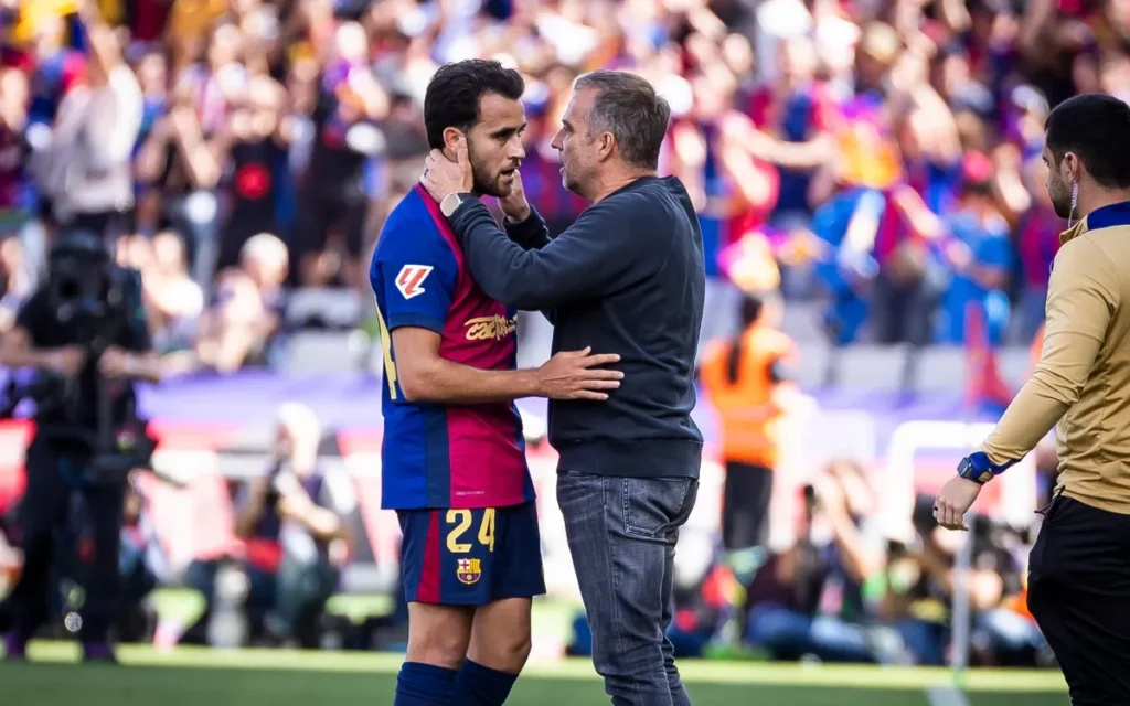 Eric García y Hansi Flick